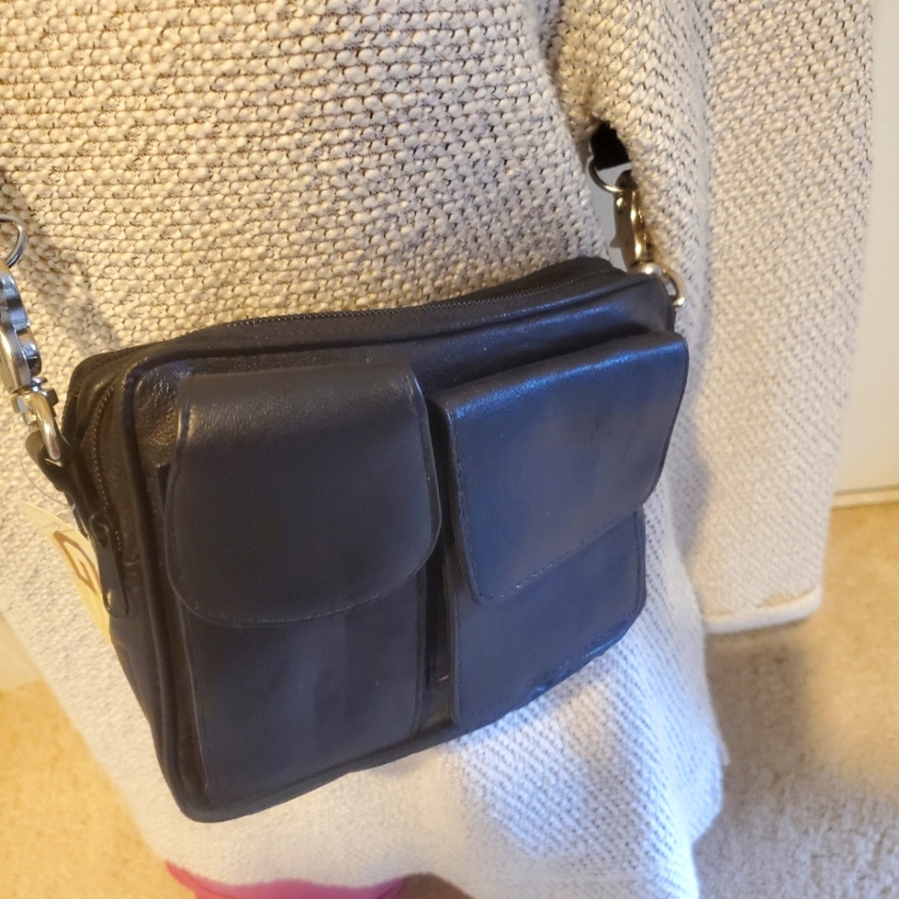Black NWT Cross Body Genuine Leather Bag 22-in Strap 2 front, 1 back pocket.